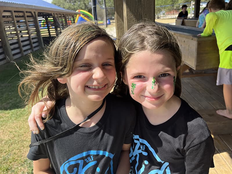 Campers gathering outdoors at OTE Camp